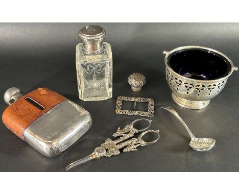 A silver lot of mixed pieces including a sugar bowl, hip flask, etc 