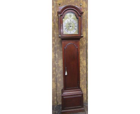 A Georgian mahogany London longcase clock with arched door the hood with column supports enclosing a broken arch brass dial w