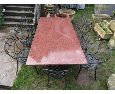 A heavy gauge ironwork garden suite comprising table with additional polished rectangular marble possibly granite top 220 cm 