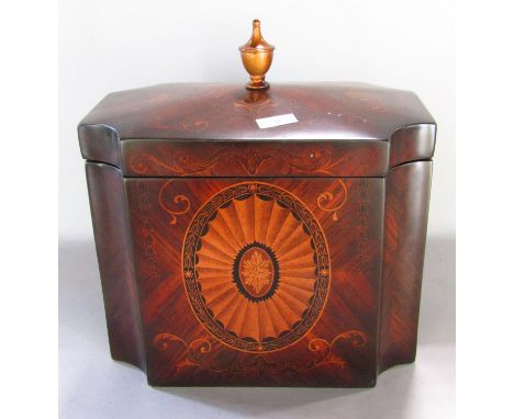 A Regency style 'tea caddy' with an all over simulated marquetry finish, surmounted by an urn finial. 