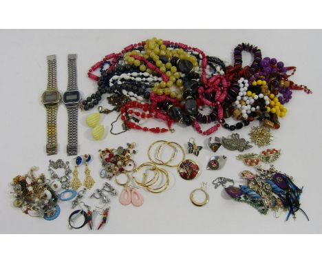 Collection of costume jewellery including earrings, bead necklaces and two Casio watches 