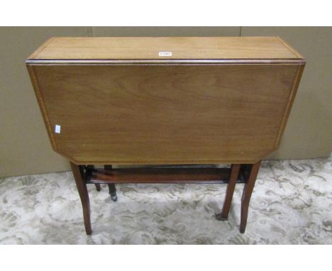 An inlaid mahogany Sutherland tea table 