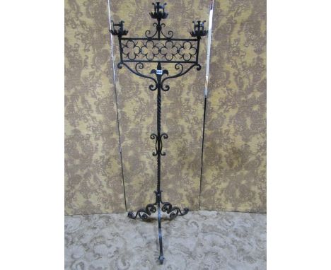 A tall good quality heavy ecclesiastical wrought iron three branch ecclesiastical pricket candle stand, on tripod base, 165cm