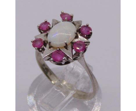 Vintage white metal ruby and opal star cluster ring, size N/O, 2.9g 