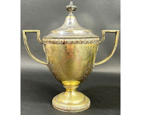 A Tiffany &amp; Co silver plated twin-handled lidded trophy cup, with applied badge to underside ‘Tiffany &amp; co, Broadway,