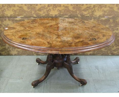 Victorian oval walnut loo table, with marquetry detail on platform base 