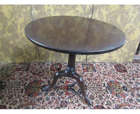 A Georgian snap top table with birdcage action and tripod base, 73cm diameter 