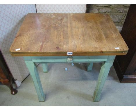 A small painted pine side / work table, the planked top over a single frieze drawer, raised on painted chamfered squared legs