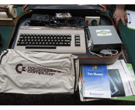 CASED COMMODORE 64 GAMES CONSOLE AND ACCESSORIES 