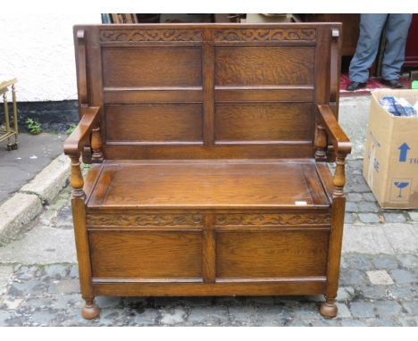 CARVED OAK MONKS BENCH 