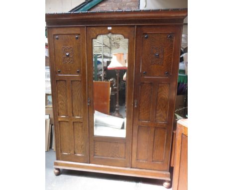 OAK MIRROR FRONTED THREE DOOR WARDROBE