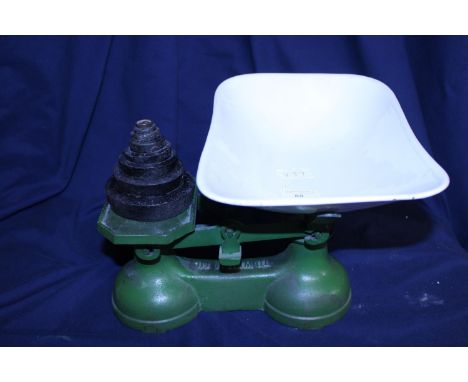 A set of vintage enamelled scales with weights.  Postage unavailable 