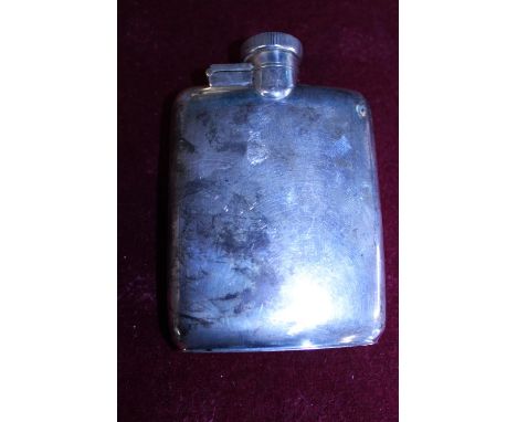 A hallmarked silver hip flask 106 grams 