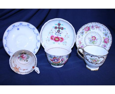 A selection of antique bone China cups and saucers 
