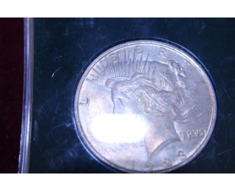 A 1923 American silver peace dollar 