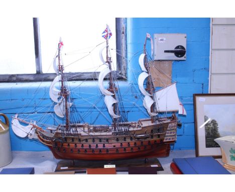 A large hand built model of HMS Victory.  Postage unavailable 