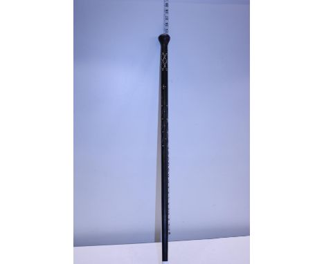 An antique ebonised walking stick with MOP inlay.  Postage unavailable 