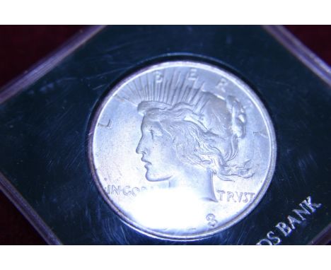 A 1923 American silver peace dollar 