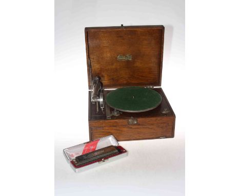 Eddison Bell table gramophone and a Larry Adler harmonica.