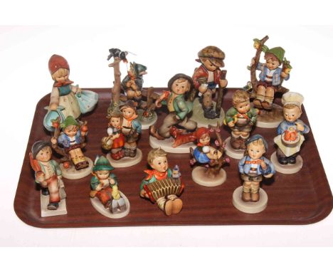 Collection of various Hummel figures.