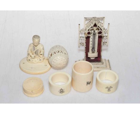 Box of old ivory and bone items including thermometer, egg box, figure, napkin rings, etc.