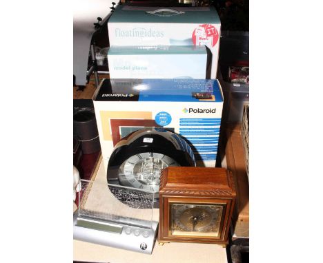 Floating Ideas Globe and Plane, Polaroid 7inch digital frame and three clocks including Elliot mantel clock.