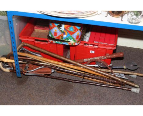 Collection of walking and shooting sticks, various oil paintings, cuckoo clock, books, horse magazines, etc.