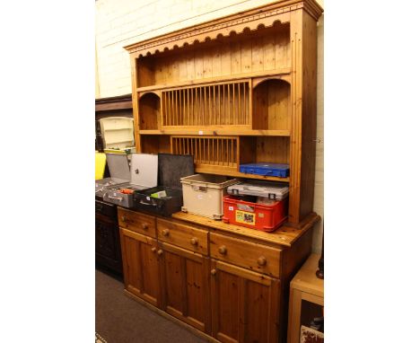 Pine shelf and hutch back three door dresser, 222cm by 159cm by 54cm.