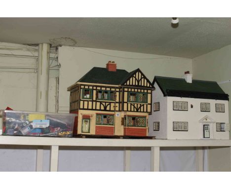 Two dolls houses including Tudor style and box of model vehicles.