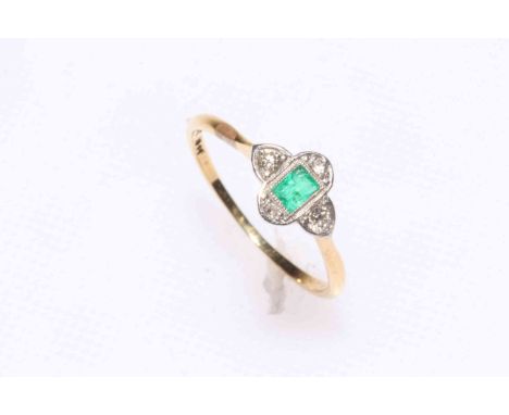 Emerald and diamond 18 carat gold and platinum ring, size P/Q.