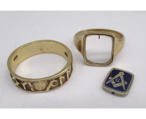 9ct yellow gold Masonic flip ring with enamel detail, stamped 375, and a silver plated ring decorated with Norwegians runes, 