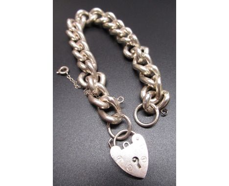 Sterling silver charm bracelet, with safety chain, hallmarked London 1974, RB Ltd, L20cm weight, 1.76ozt 