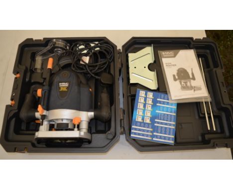 Cased MacAllister 1500W handheld router (COD1500WR) with manual, bits etc 