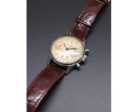 Late 1940's Leonidas chrome cased hand wound chronograph wristwatch. signed silvered dial with two subsidiary dials, running 