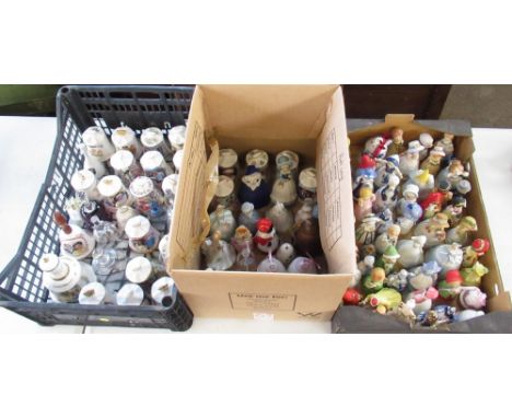Collection of ceramic and glass bells, inc. commemorative ware bells, figures with bells, etc. (3 boxes) 