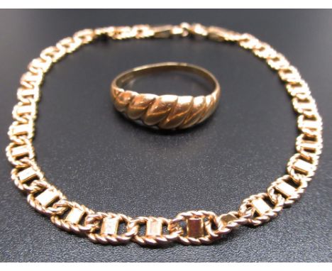 9ct yellow gold chain bracelet, stamped 375, and a 9ct yellow gold ring with twist detail, size P, gross 5.8g (2) 