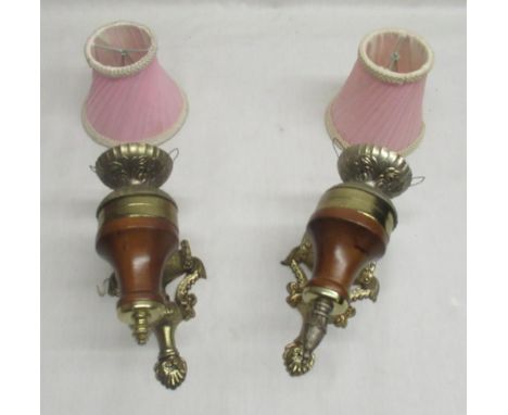 Pair of brass and wood wall lights with pink lamp shades 