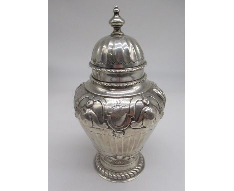 Continental silver tea caddy with English import marks for London, 1889, the urn shaped body with fluted detail, the lift off