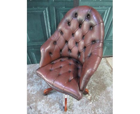 Arched back swivel office chair, brass nail and button upholstered in brown leather, H111cm 
