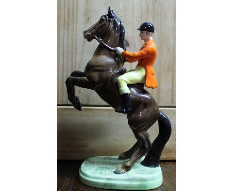 Beswick model of rearing Huntsman, first version, in brown colourway, model no. 868 