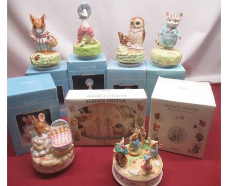 Six Schmid Beatrix Potter music box figures and a Schmid Beatrix Potter ceramic gardening set (7) 