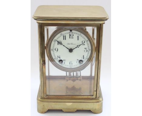 Seth Thomas early C20th American four glass brass cased mantel clock, full length bevel edged panel door opening to reveal si