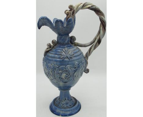 C19th Castle Hedingham - Edward Bingham medieval style blue glazed ewer shaped jug, rope twist handle with raised scrolling f
