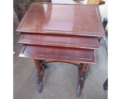 Nest of three Regency style mahogany tables by Archer &amp; Smith Ltd. of Swindon, rectangular tops on bamboo style supports 