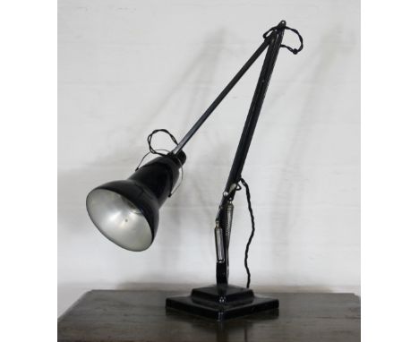 A black 'The Anglepoise' lamp, on square base