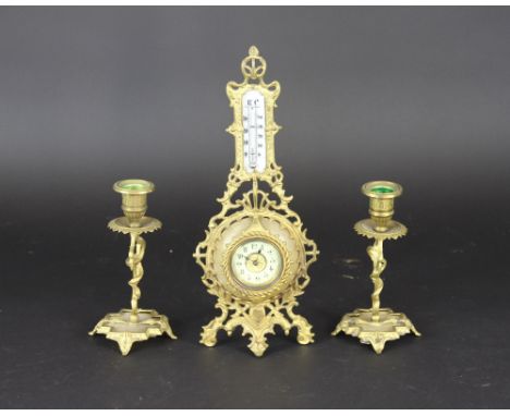 A late 19th century continental gilt metal and alabaster time piece garniture, with thermometer, matched,31.5cm tall (a/f) 