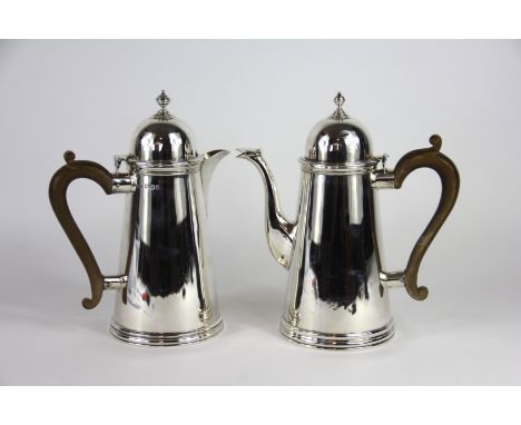 Two George II style silver cafe au lait pots, Crichton Brothers, London 1919 and 1920, each of tapering conical form with dom