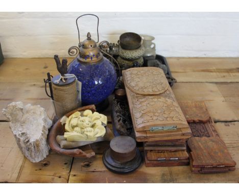 A Roman glass vessel, a collection of candlesticks, Indian style brass bowls, a door knocker in the form of a mask, a Victori