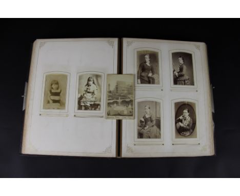 A Victorian photograph album, enclosing various portrait photographs, views and one of The Crystal Palace (1)