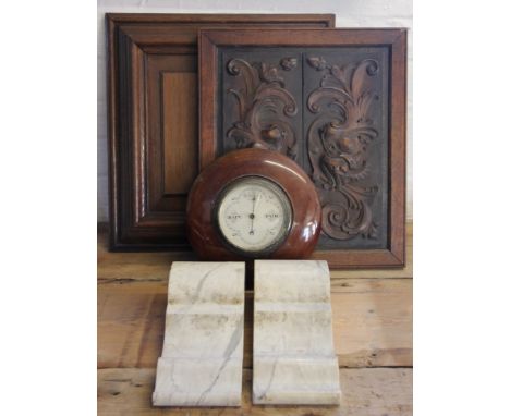 A Stanley of London mahogany case aneroid barometer; a pair of marble corbels; a carved oak panel and a fielded oak panel (5)